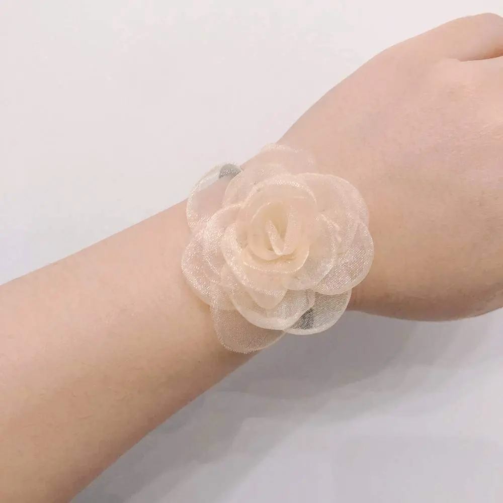 24 Pairs of Pink Bulk Foldable Ballet Flats for Wedding Guests by Lumos Blue Organza Camellia Wrist Corsage